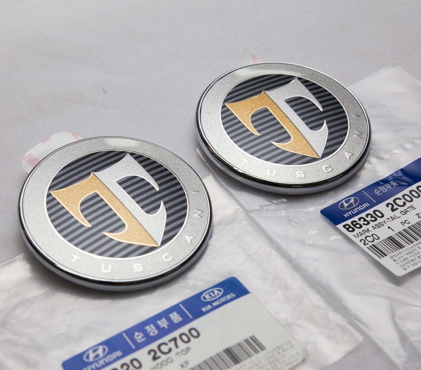 thumbnail image 2 of Genuine OEM Hyundai Hood Emblem For 2003-2006 Tuscani / Tiburon - 86320-2C000 2 of 5